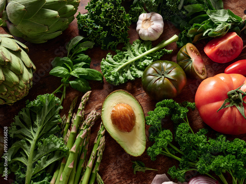 Colorful flat lay of fresh vegetables on rustic wooden table showcasing options for vegan meals and healthy eating ideas throughout the day