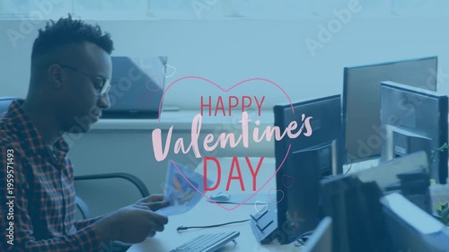Animation of happy valentines day text over diverse businessmen with documents in office