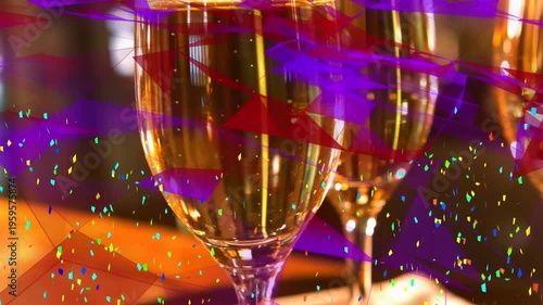 Animation of shapes and confetti over glasses of champagne