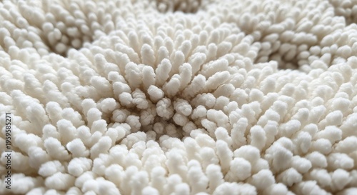 Extremely close-up of a soft, white shaggy microfiber material with deep pile.