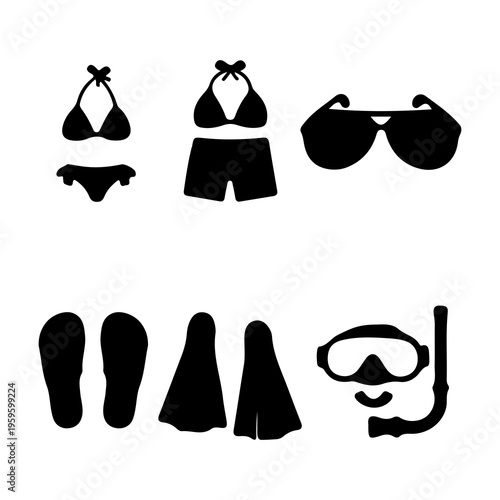 A collection of black silhouettes representing summer holiday beach and scuba diving equipment