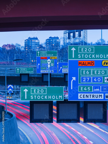 Road signs showing direction to Stockholm and Malmö from Gothenburg during evening hours