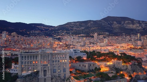 Aerial Cityscape Golden Hour Over Facades, Hillside Skyline And Coastal Bay Drone Sweeps Across Ornate Palace. Monaco