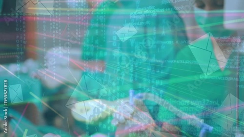 Animation of digital interface k over surgeons in operating theatre