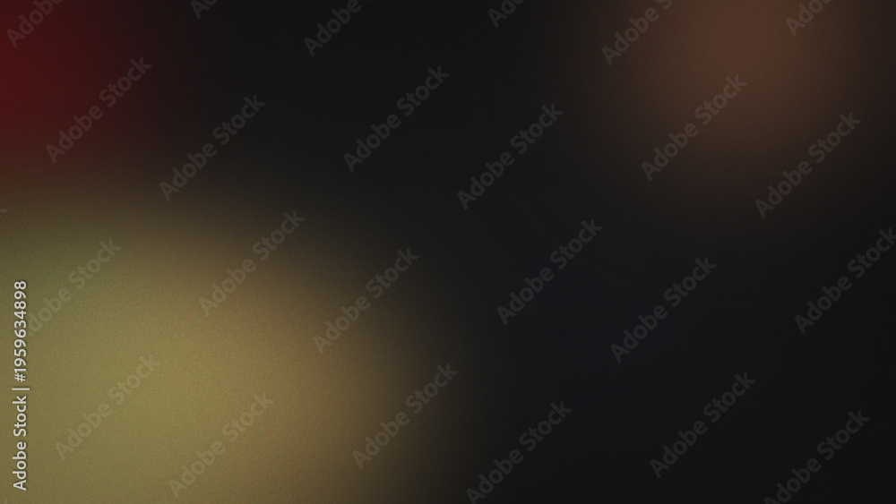 Obraz premium Dark abstract background with soft grainy texture and subtle blurred gradients in muted red brown and yellow tones on a deep black base