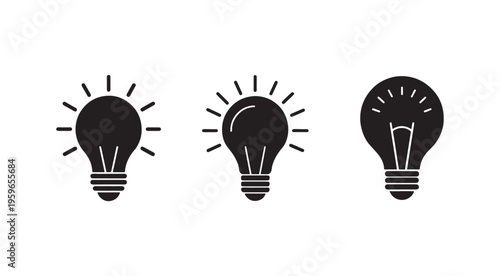Three black light bulb icons with rays on white background  symbolizing ideas and innovation