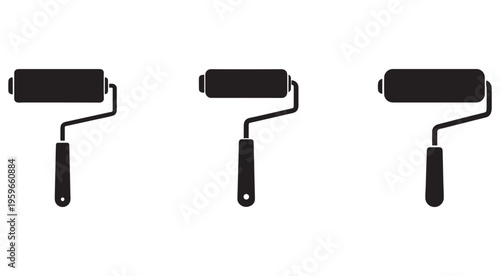 Three paint rollers with handles in different positions for painting walls and surfaces  tools for home improvement and decoration