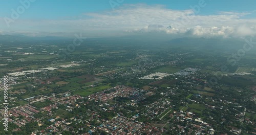 Wallpaper Mural Flying from above view of city and farm lard in tropical island. General Santos in Mindanao, Philippines. Cityscape. Torontodigital.ca