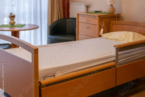 Φωτογραφία Modern medical bed in hospital, nursing home bed with wooden frame, adjustable m