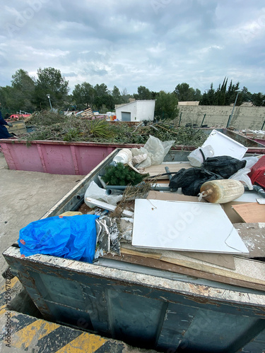 a container with mixed bulky waste at a recycling facility