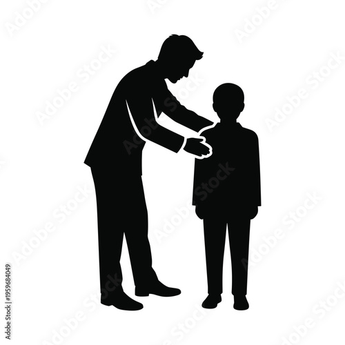 Silhouette of a father adjusting his son's collar, symbolizing guidance and parental care