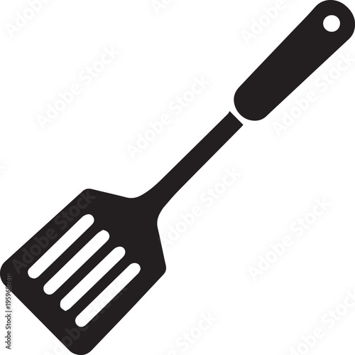 A simple black silhouette icon of a slotted kitchen spatula used for cooking and flipping food Vector