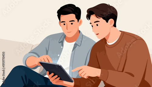 Two young men share a tablet together. One points at the screen, smiling. The other looks on, engaged and amused. They sit closely, relaxed and focused. Ideal for scenes of teamwork or learning