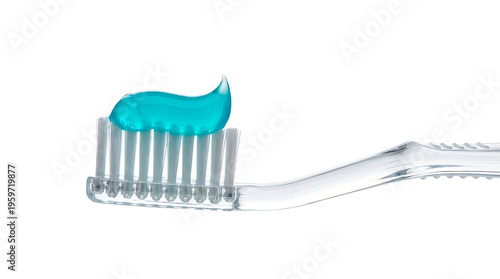 Close-up of a toothbrush with toothpaste, promoting dental hygiene. The vibrant blue toothpaste contrasts with the clean bristles