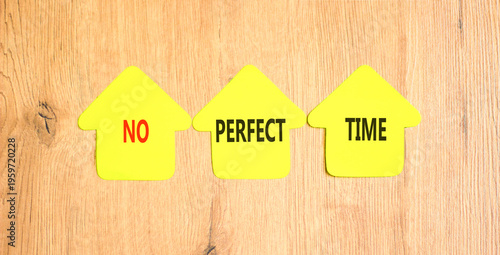 No perfect time words symbol. Concept words No perfect time on beautiful yellow paper houses. Beautiful wooden background. Business and no perfect time concept. Copy space.