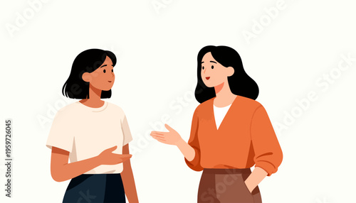 Two women converse warmly in a minimalist setting. One gestures expressively while the other listens attentively. Their calm expressions suggest a friendly or supportive interaction