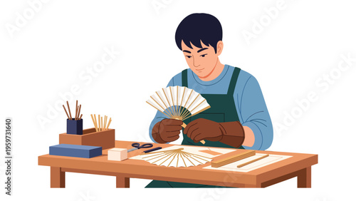 Artisan Crafting a Fan: A focused artisan meticulously works on a traditional fan, showcasing the dedication to his craft and the beauty of handmade artistry.