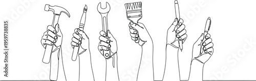 Hands holding various tools for construction and repair work effectively