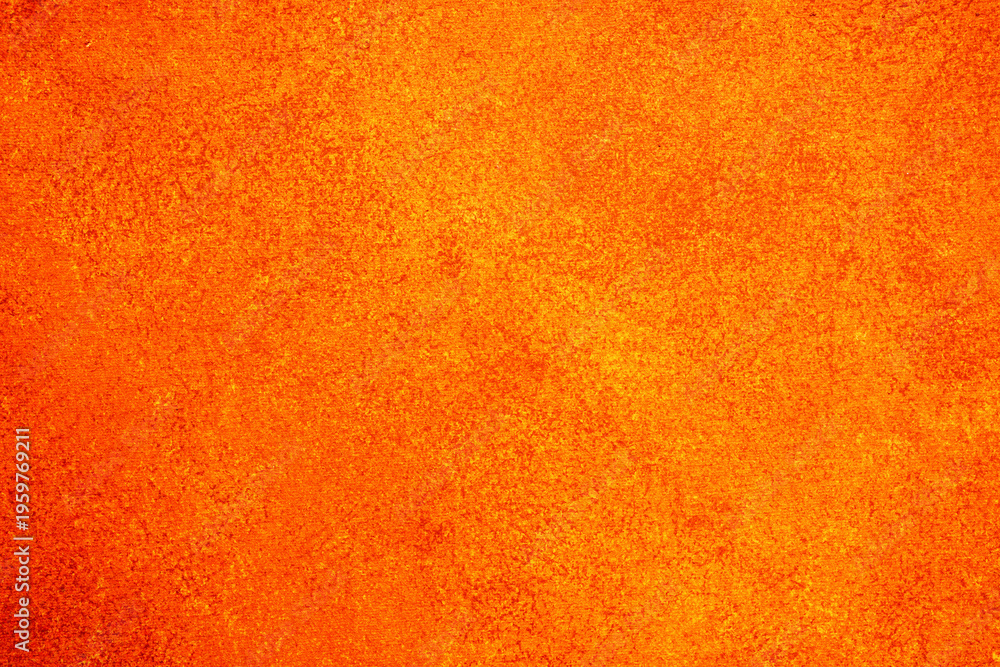 Fototapeta premium Orange grunge texture creating a vibrant warm abstract background