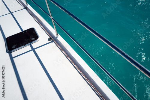Views of the water and beaches on a catamaran sail boat on Sint Maarten island in the Caribbean Sea.