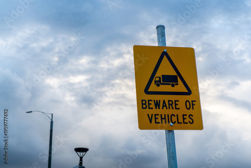 warning yellow sign on a road 