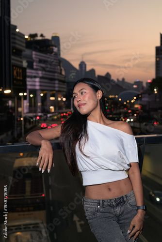 Thai Woman Tourist at Hong Kong Night Skyline