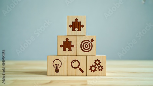 Creative problem solving concept with wooden blocks showing puzzle pieces target and idea icons on blue background 