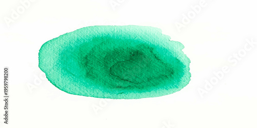 A colorful green and blue kitchen sponge for washing dishes is isolated on a white background as a domestic housework object for hygiene and cleaning
