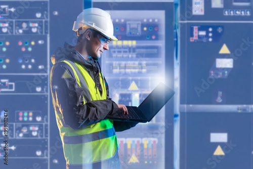 фотографія Electrical engineering, technician monitors control panels and analyzes system data on laptop