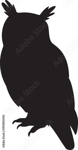 Silhouette of an owl perched on a branch looking sideways