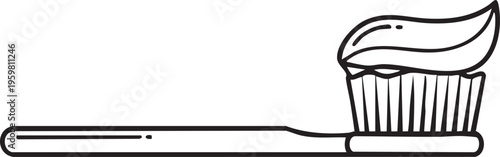 A toothbrush lies next to a cupcake with frosting on top.