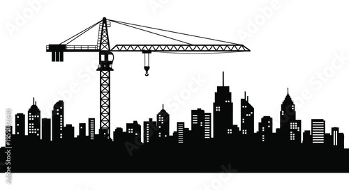 City skyline with a construction crane in stark silhouette