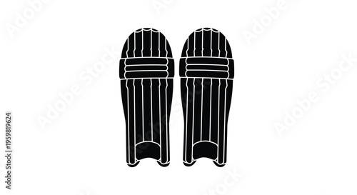 A pair of black cricket batting pads isolated on a white background