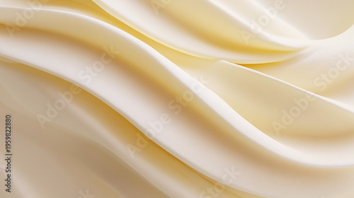Macro texture of creamy vanilla swirls, smooth ivory butter or whipped cosmetic lotion background