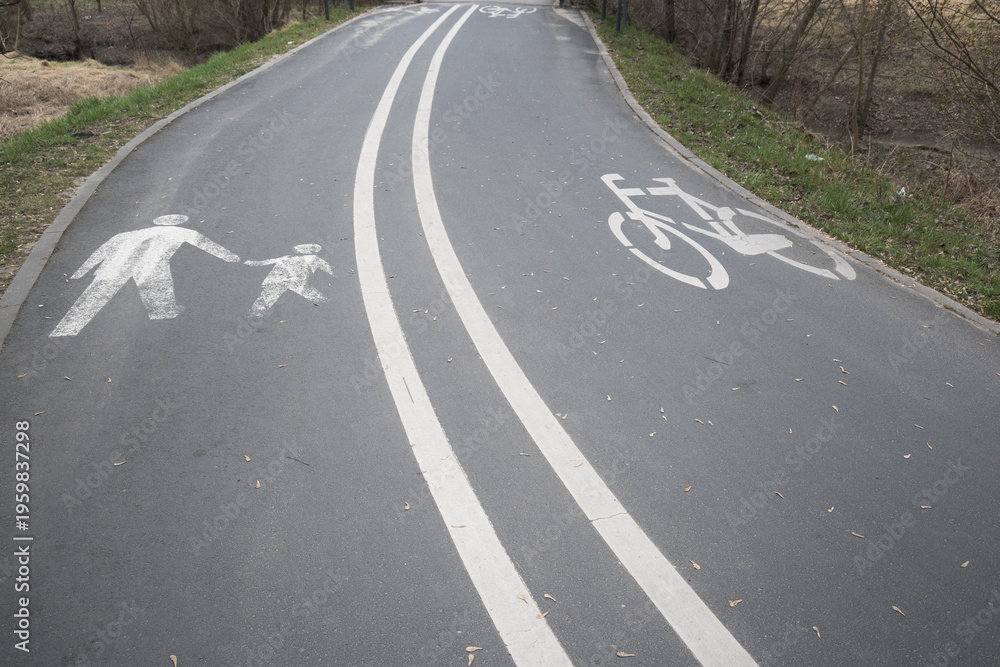 Naklejka premium Road marking with separated pedestrian and bicycle lanes.