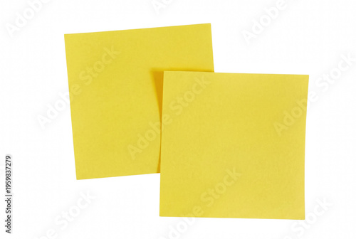 Two Overlapping Yellow Adhesive Sticky Notes on Dark Surface