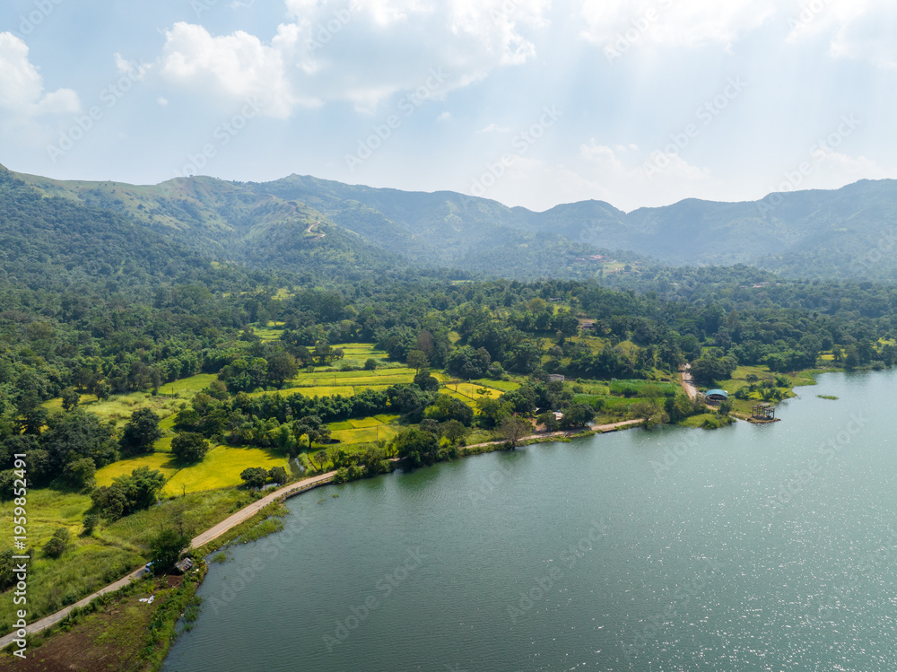 Obraz premium Natural Beauty of Panshet Backwaters with Agricultural Fields and Hills