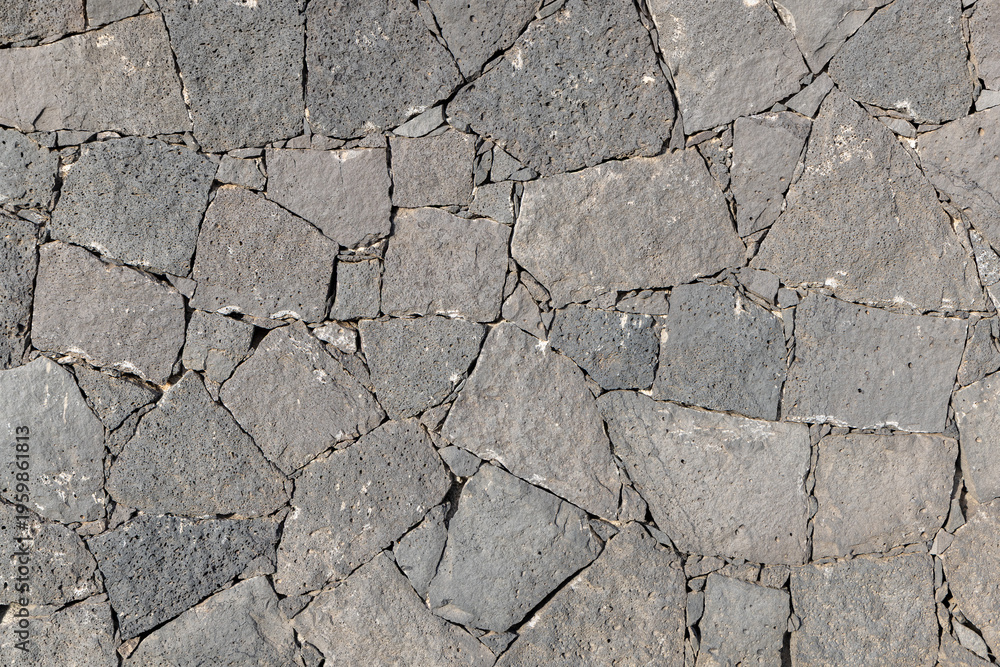 Obraz premium historic seamless volcano stone wall in grey as background