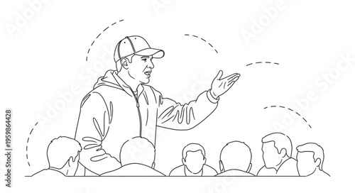 Man in cap addressing a crowd, gesturing with his hand.