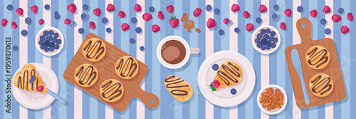 Delicious dessert spread with chocolate pastries and fresh berries on blue striped tablecloth