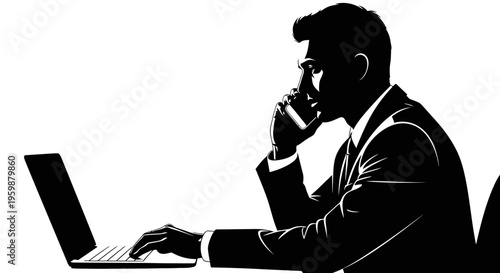 Silhouette of Businessman Working on Laptop and Talking on Phone