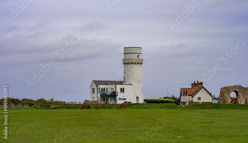 Bild auf Leinwand The exterior of the old and historical and abandoned Lighthouse on the clifftops