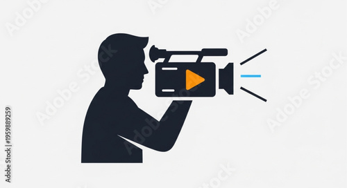 Silhouette of a Cameraman Filming with a Professional Video Camera.