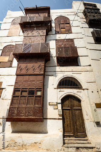 Traditional architecture of old Jeddah town El Balad district houses with wooden windows and balconies Unesco Heritage site in Jeddah Saudi Arabia