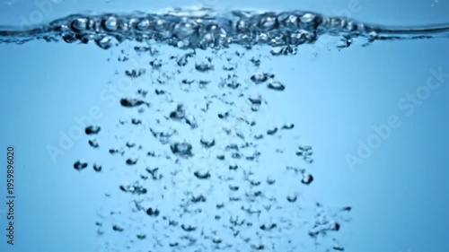 Water Bubbles Rising to Surface Underwater.