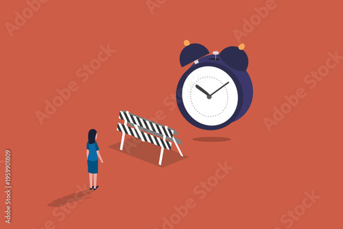Business woman walking toward a giant alarm clock behind a road barrier, representing time management, project deadlines, and overcoming delays