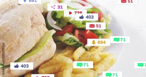 Cursor hovering, badges spawning and obscuring plated sandwich, representing social buzz