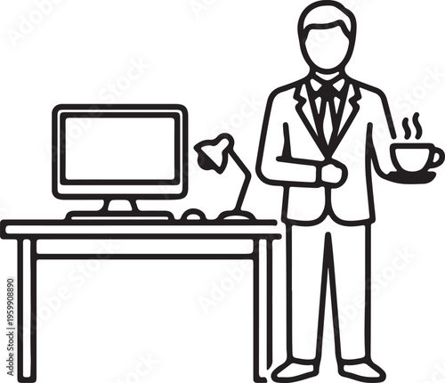 Male employee standing by desk with computer holding hot coffee cup
