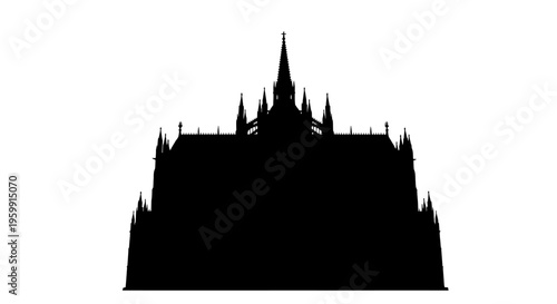 Intricate gothic castle stands boldly against a bright white background silhouette