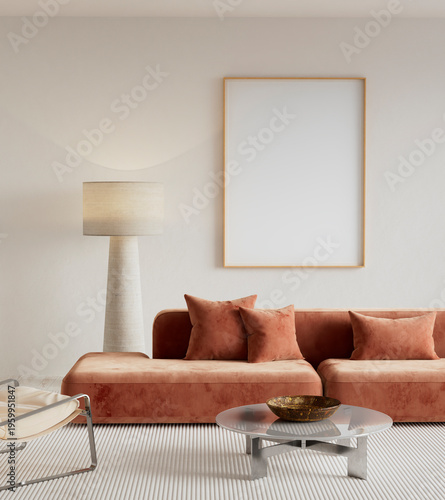 Stylish interior design with a blank poster frame mockup on a white wall above a modern terracotta velvet sofa for art presentation and home decoration. 3D illustration